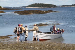 Departing on dory from Harbor Island. By Stephen Kress.